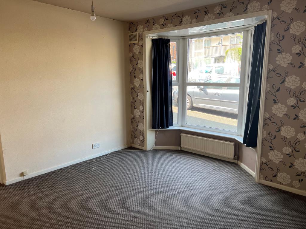 Lot: 85 - TOWN CENTRE SIX-BEDROOM HOUSE WITH POTENTIAL - One of the ground floor reception rooms